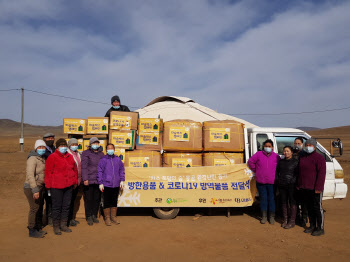 오비맥주, '카스 희망의 숲' 몽골 환경난민에 방한·방역품 지원