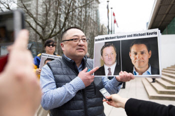 中, 간첩 혐의 캐나다인에 징역 11년…화웨이 보복 수위 높여