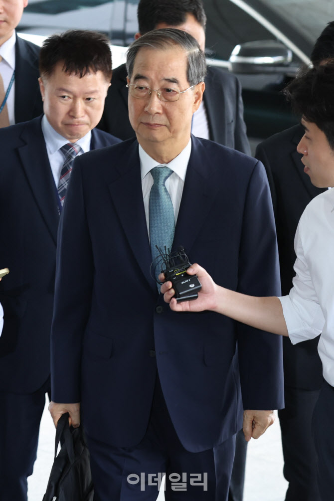 [포토]한덕수 전 총리, 피의자 신분으로 내란특검 출석