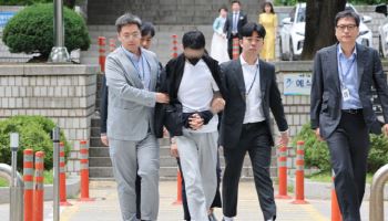 경복궁 낙서 사주범, 범죄수익은닉 혐의로 징역 1년