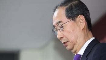 민주당 "한덕수 출마 배경이 尹?…대선개입"