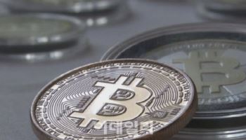 가상자산 '1거래소·1은행' 원칙 그대로 유지키로