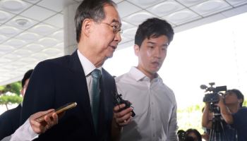 '내란 가담 의혹' 한덕수 전 총리, 피의자 신분 특검 출석