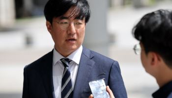 김성회 민주당 의원 내란특검 출석…"국힘, 조사 응해야"
