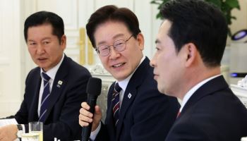  李대통령 “피해지원금이 현찰 나눠주기?…표현 과해”