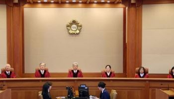 [속보]헌재 "공익법무관의 군사교육 보수 미지급은 위헌"