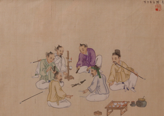  기산 김준근의 '투전하는 모양'                                                                                                                                                          