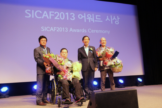 정욱 대원미디어 회장, 국내 최고 권위 SICAF 2013 어워드 수상