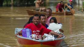 말련, 30년래 최악의 홍수..8명 사망·16만명 대피