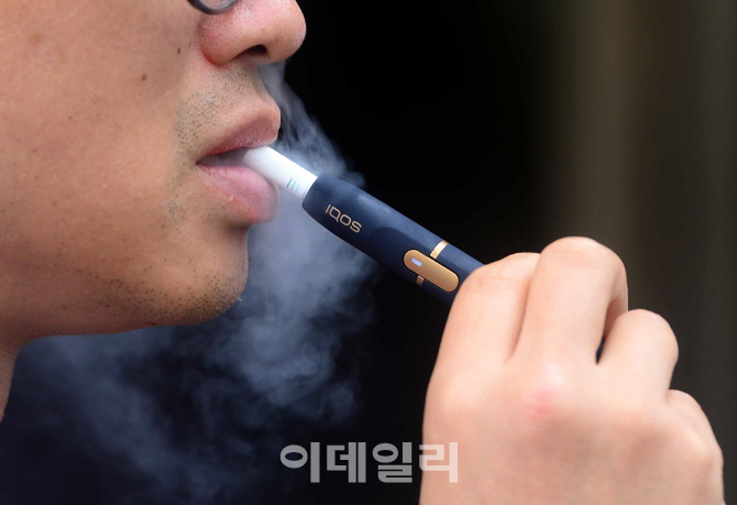 아이코스는 왜 경고그림이 없지?…보건당국 "제한적 부착 검토"