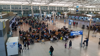 정유년과 무술년이 마주친 곳…새해 기대 품은 인천공항