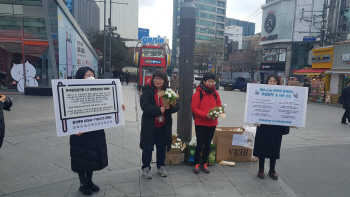"#미투 지지합니다"…서울 도심에 핀 흰장미
