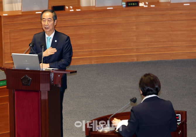 '답변하는 한덕수 총리'                                                                                                                                                                  