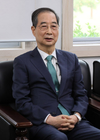 한덕수 '경선 고배' 한동훈에 