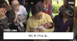 “마음 아파” 아기 안고 우산 씌워주고…李대통령, 수재민 위로