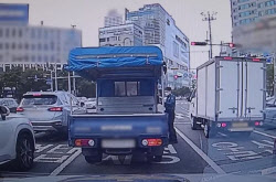 &apos;벌금 4억4000만원?!&apos;...경찰도 눈을 의심한 화물차 정체