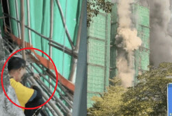 홍콩 화재 전 포착된 ‘흡연’ 장면…실화 가능성 무게