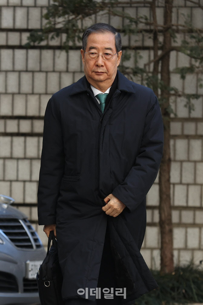 1심 선고 공판 출석하는 한덕수 전 총리                                                                                                                                                             