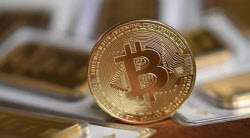 롤러코스터 이후 7만달러에 멈춰선 비트코인…"곧 변동성 커지며 방향 결정"