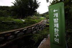 “강남 그린벨트 진짜 풀려요?”…중개소 전화벨 울렸다