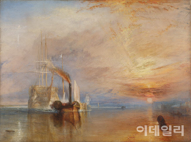 윌리엄 터너의 ‘전함 테메레르호의 마지막 항해’(1839). 영국의 ‘국민 그림’이라 불리는 걸작이다. 테메레르호는 1798년에 진수한 3층 갑판의 목조 군함으로 1805년 트라팔가해전에서 넬슨 제독을 구하고 프랑스 군함 두 척을 포획하며 대승을 이끌었다. 하지만 33년의 세월을 못 이겨내 부품을 다 뜯어낸 껍데기로 해체돼야 했고 1838년 템스강을 거슬러 선박 해체장으로 예인되는 그 마지막 항해를 터너가 포착했다. 해체장으로 가기 전 돛대까지 모두 철거됐지만 터너는 테메레르호의 마지막 품격을 지켜주기 위해 돛대를 그대로 살려냈다. 수많은 자산가·수집가가 거액 제안도 뿌리치고 터너는 평생 이 작품을 팔지 않다가 죽기 전 다른 명작들과 함께 국가에 기증했다. 캔버스에 유채, 90×121.6㎝. 내셔널갤러리(영국 런던) 소장.