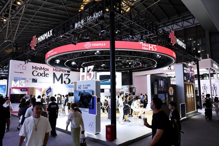 People walk past the Minimax booth during the World Artificial Intelligence Conference (WAIC) in Shanghai, China, July 17, 2026. REUTERS/Go Nakamura