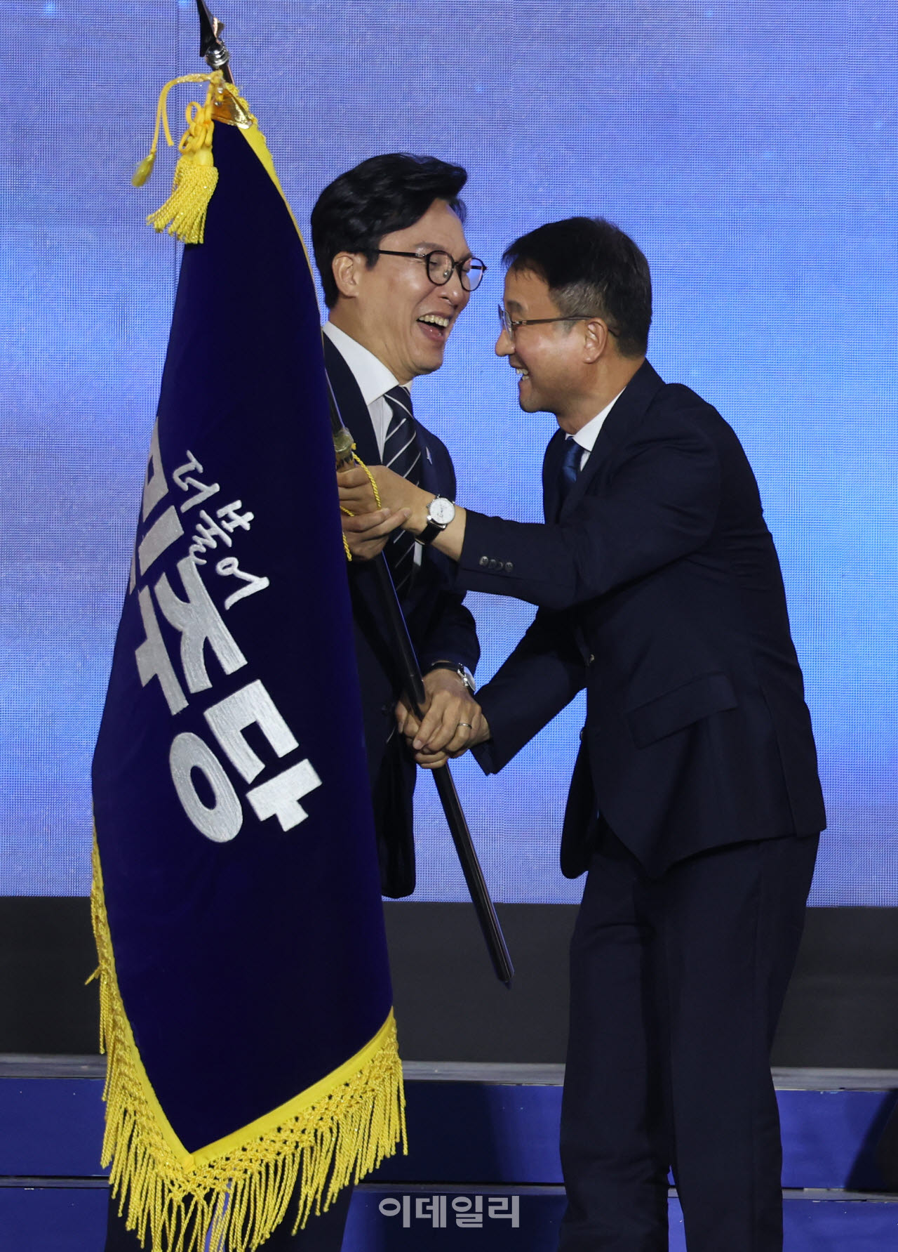 당기
