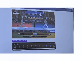 SKT-FAN을 통해 분석한 펜싱 경기 영상을 시연되고 있다. 하단의 빨간색, 파란색 점은 해당 선수가 득점한 장면 타임라인 지점이다(사진=윤정훈 기자)