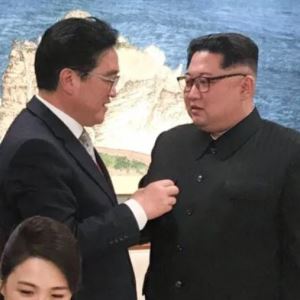 우원식 “7년 만에 봅니다” 인사에...김정은 의외의 반응