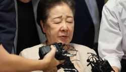 비단 돈뭉치에 '왕(王)'...통일교, 尹 만났다