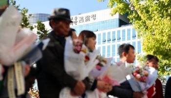 '청산가리 막걸리 수사 지휘' 김회재, 정계은퇴 요구 일축